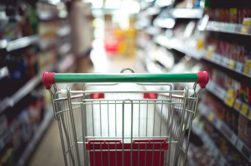Closeup detail of a woman shopping in a supermarket